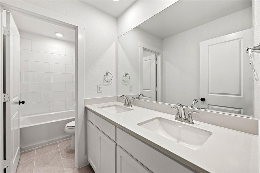 Furnished interior view inside a new home in North Square at Uptown, Celina (Image 11).