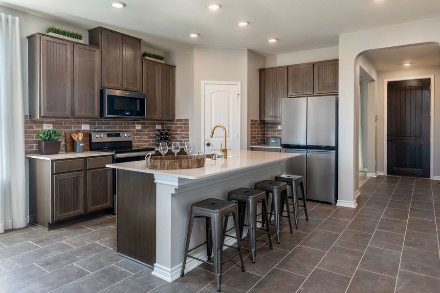 Representative furnished interior of a home built from the 2701 Modeled by KB Home in Legend Heights - Sterling Collection, New Braunfels (Image 6).