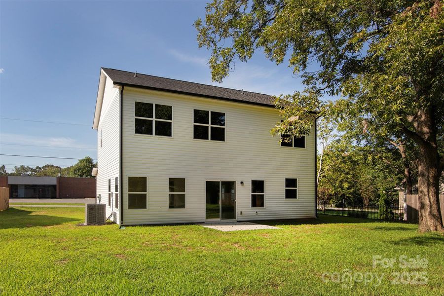 Front exterior of a new home in , Stanley, NC, highlighting curb appeal (Image 21).