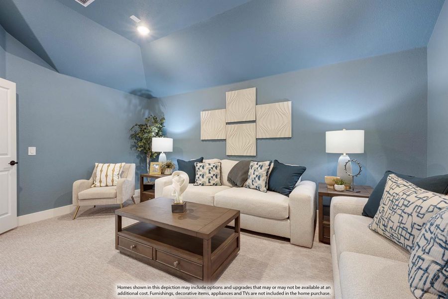 Living room with blue walls, vaulted ceiling, cream sofas, and wood coffee table on carpet