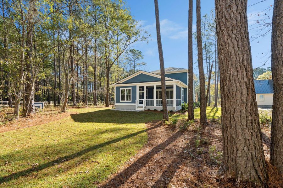 Exterior details and patio area of a home in , Awendaw (Image 43).