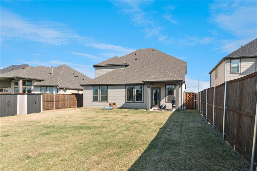Exterior details and patio area of a home in Creekside, Royse City (Image 21).