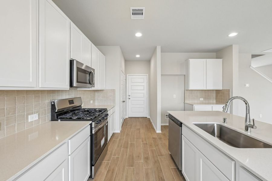 Furnished interior view inside a new home in Azalea, Pattison (Image 12).