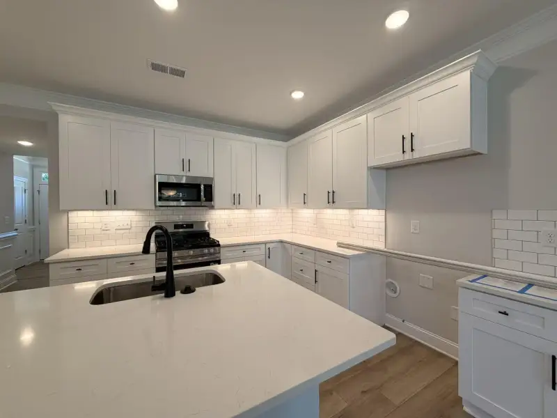Furnished interior view inside a new home in Harrisburg Village Townhomes, Harrisburg (Image 6).