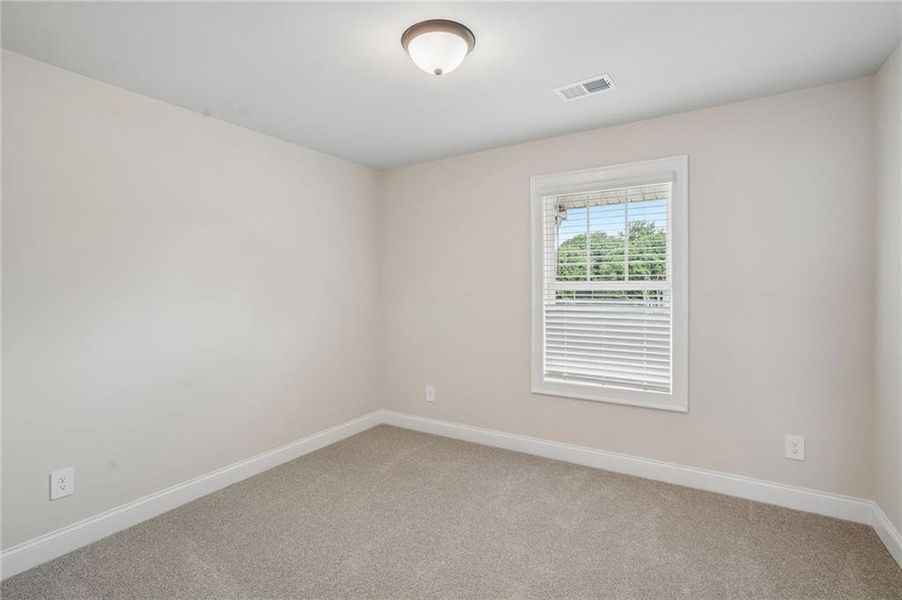 Spacious, unfurnished interior of a new home in Hemingway - Highland Series, Cumming (Image 30). Spacious, unfurnished interior of a new home in Hemingway - Highland Series, Cumming (Image 30).