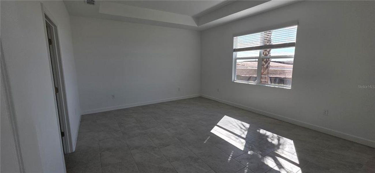 Spacious, unfurnished interior of a new home in Rye Ranch: Manor Homes, Parrish (Image 11).