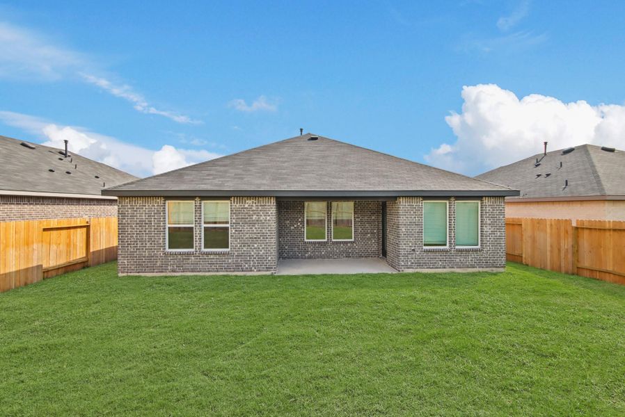 Exterior details and patio area of a home in Harrington Trails at The Canopies, Splendora (Image 3). Exterior details and patio area of a home in Harrington Trails at The Canopies, Splendora (Image 3).