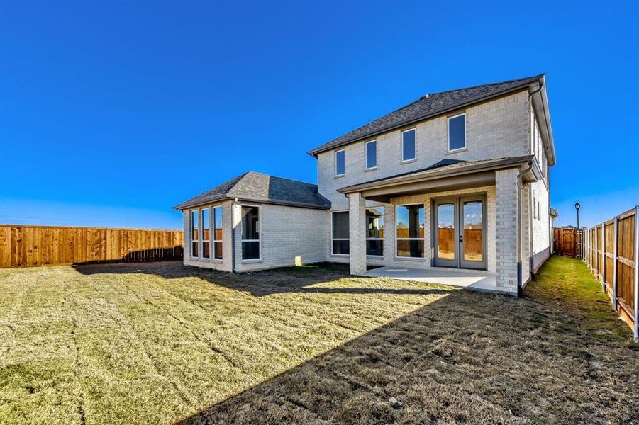 Exterior details and patio area of a home in Wellington, Fort Worth (Image 4). Exterior details and patio area of a home in Wellington, Fort Worth (Image 4).