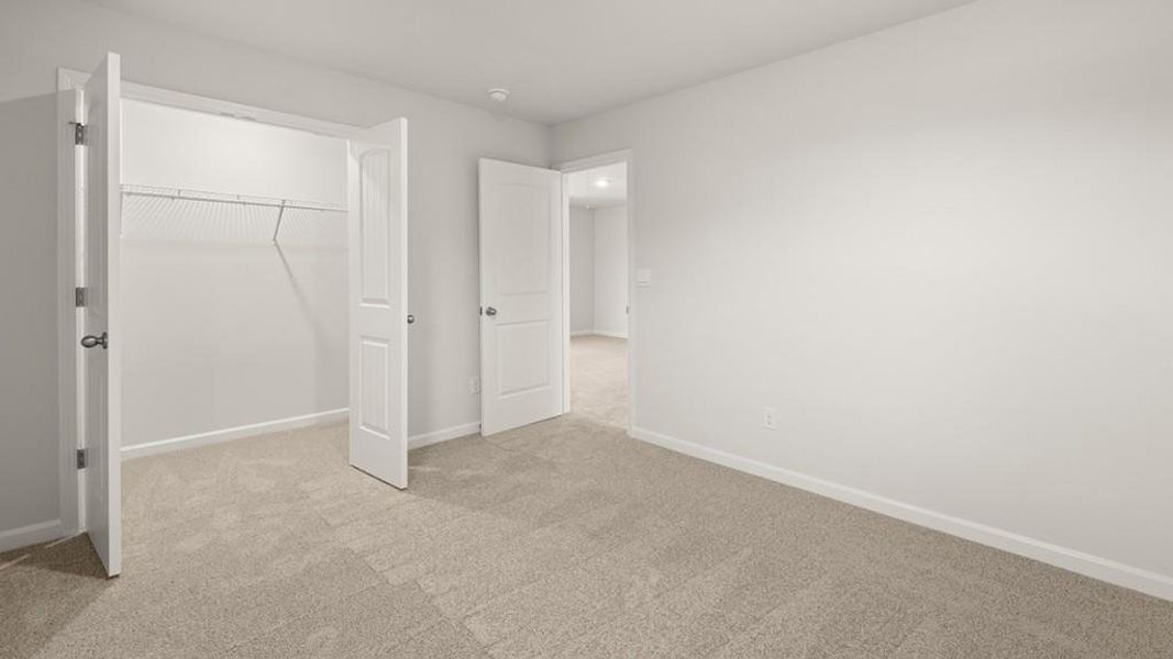 Spacious, unfurnished interior of a new home in Butner Estates, South Fulton (Image 22).