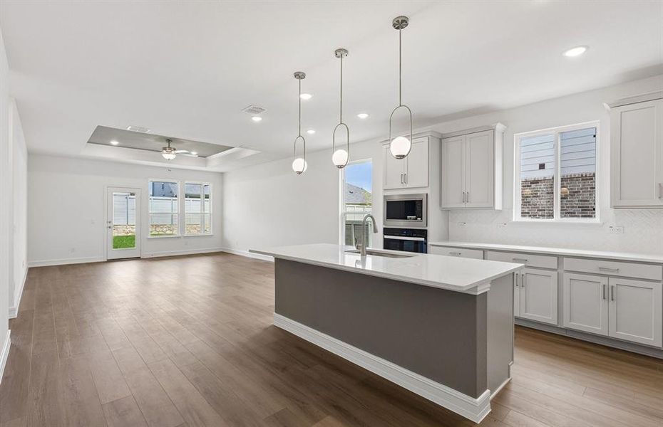 Kitchen with eat-in bartop island