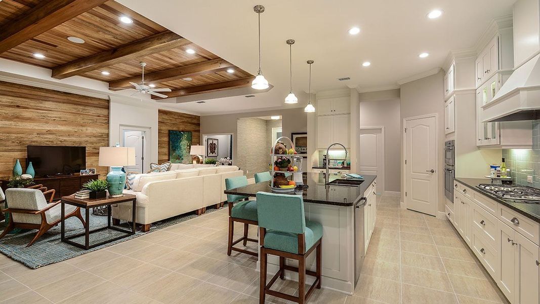 Furnished interior view inside a new home in SkySail Real Estate and Homes for Sale in Naples, FL - Neal Communities, Naples (Image 6).