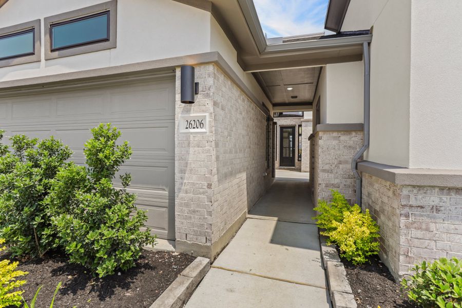 Exterior details and patio area of a home in Jubilee 45', 50', 70', Hockley (Image 32).