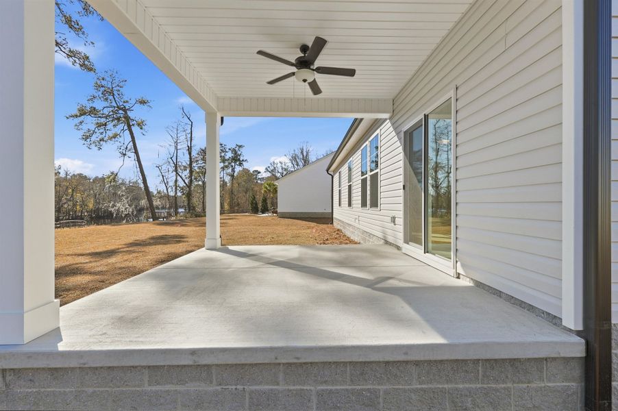 Exterior details and patio area of a home in Oak Hollow, Longs (Image 3).