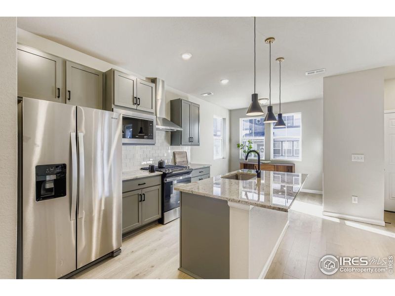 Sleek granite counters and modern finishes