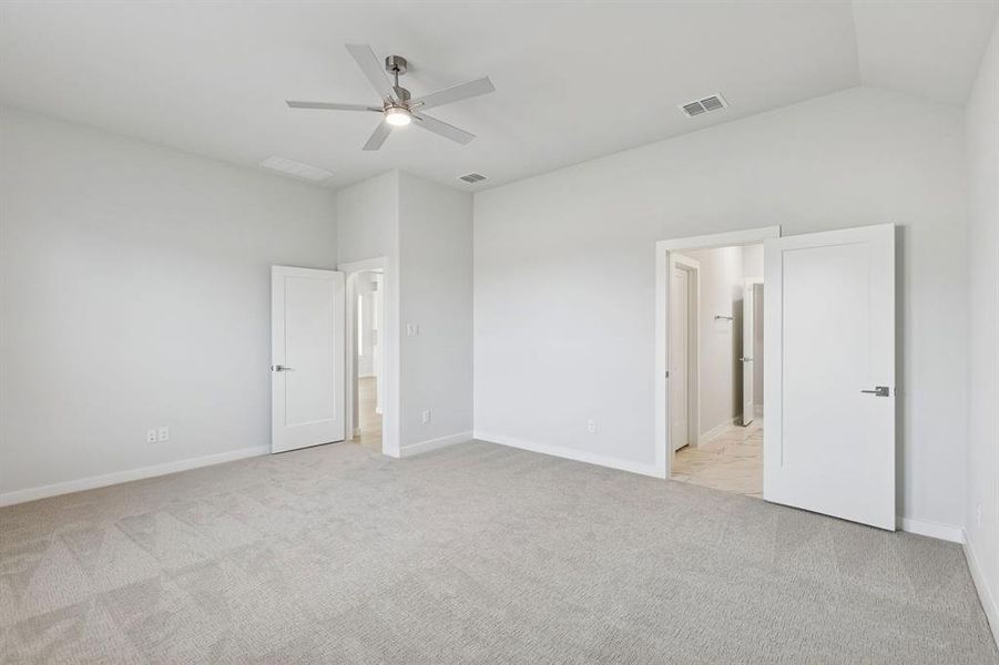 Primary Suite in the Stanley II home plan by Trophy Signature Homes – REPRESENTATIVE PHOTO