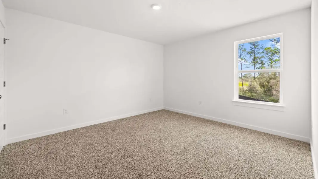 Spacious, unfurnished interior of a new home in Magnolia at the Bluffs Phase 3, Freeport (Image 20).