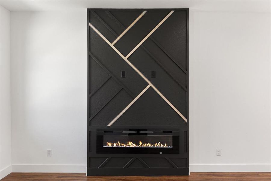 Detailed view of wood finished floors and baseboards