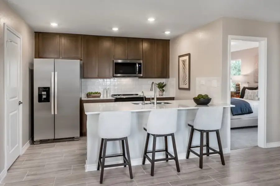 Representative furnished interior of a home built from the 1417 by KB Home in Espino, San Antonio (Image 4).
