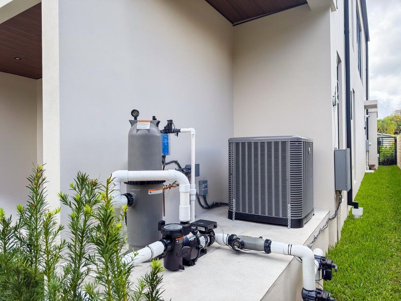 (as of April 8, 2026) HVAC and pool systems raised and conveniently hidden behind wall and landscaping (doesn't not include pool heater)