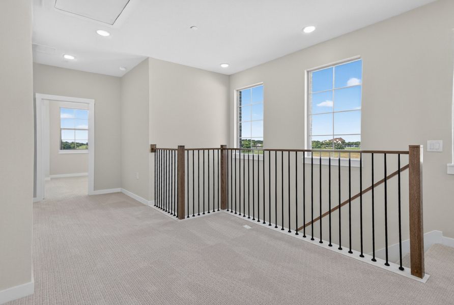 Spacious, unfurnished interior of a new home in The Tribute, The Colony (Image 27).