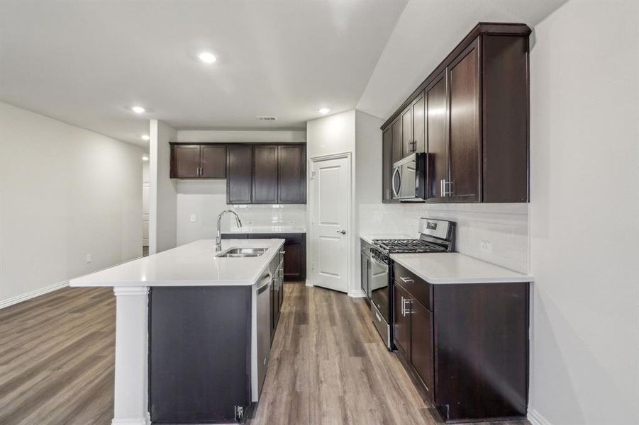 Photo is not of the actual home, but is an inspirational photo of builder’s model home and may depict options, furnishings, and/or decorator features that are not included.