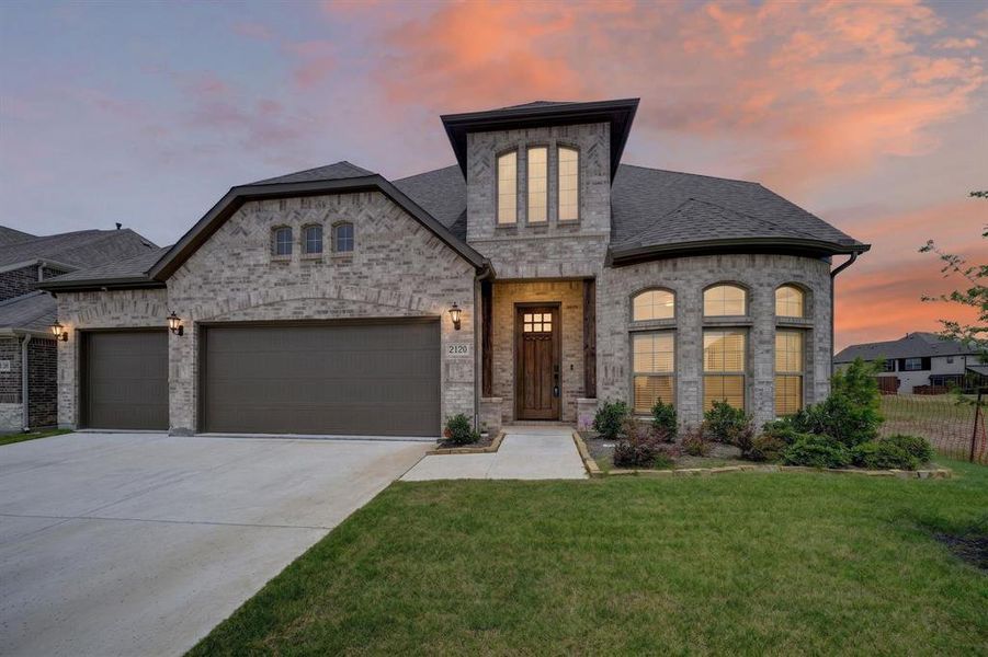 Front exterior of a new home in Stone River Glen, Royse City, TX, highlighting curb appeal (Image 2). Front exterior of a new home in Stone River Glen, Royse City, TX, highlighting curb appeal (Image 2).