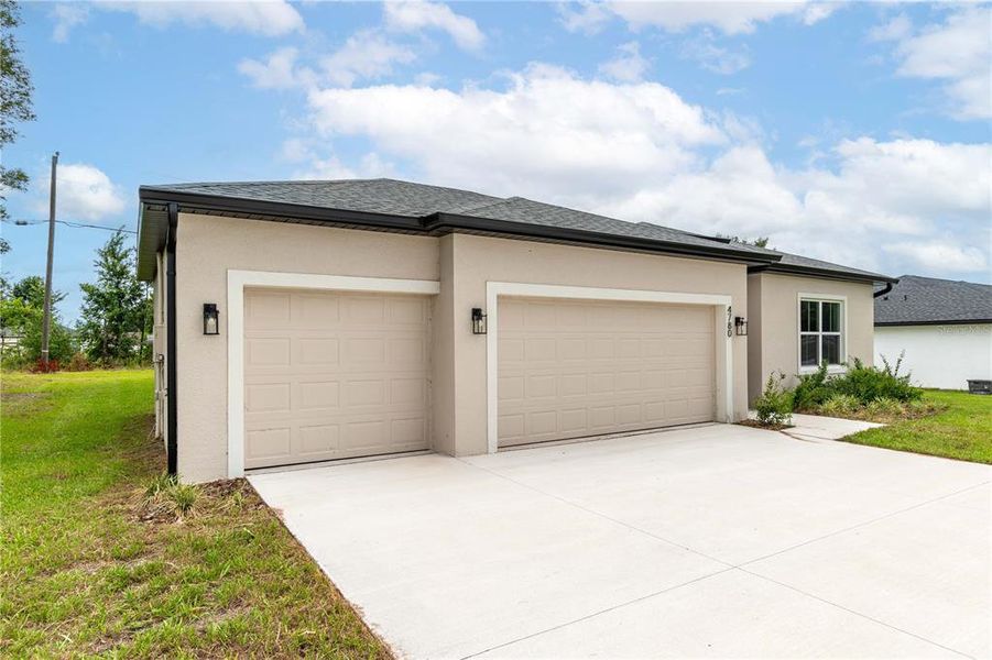 Front exterior of a new home in , Ocala, FL, highlighting curb appeal (Image 13).
