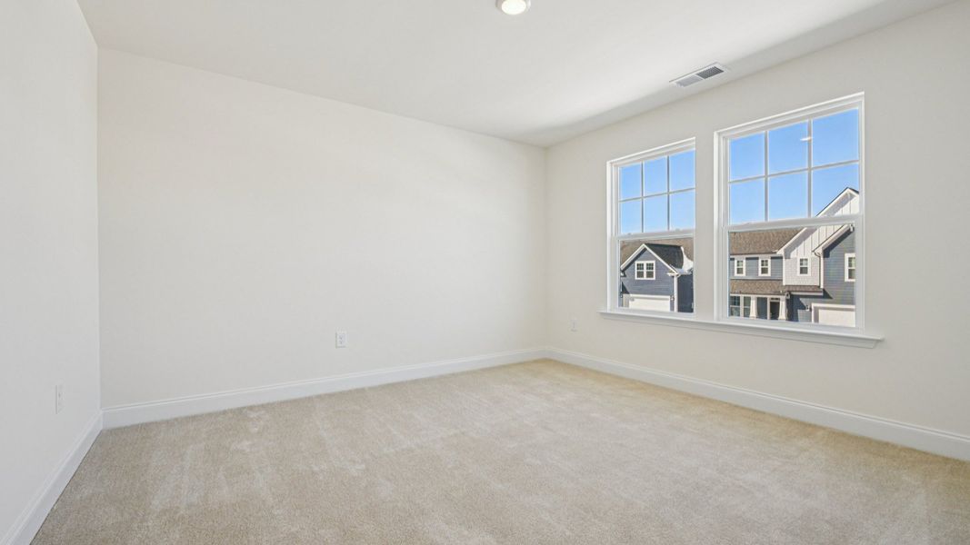 Representative furnished interior of a home built from the Wagener by DRB Homes in Station Pointe, Angier (Image 38).