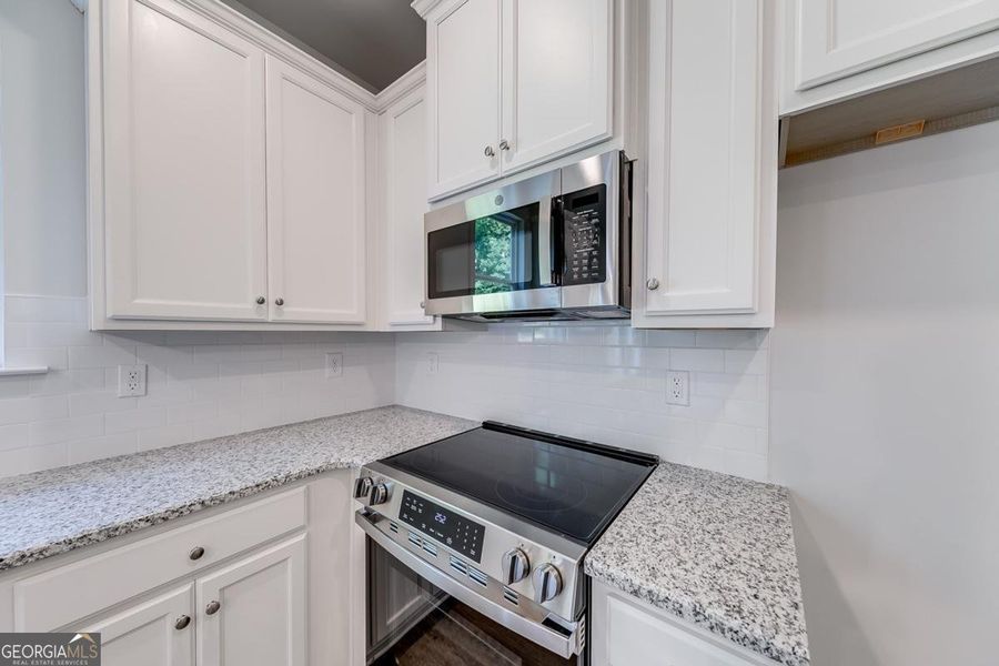 Furnished interior view inside a new home in Chimney Oaks Townhomes, Homer (Image 5).