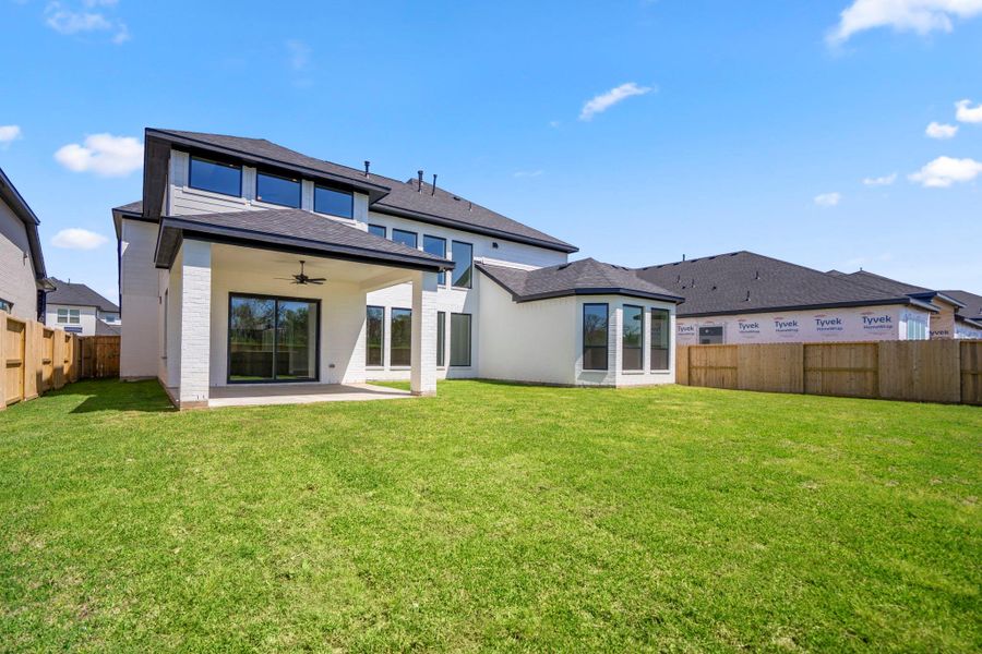 Exterior details and patio area of a home in Sienna 70′ Lots, Missouri City (Image 34).