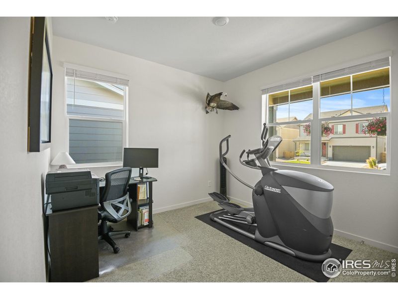 third bedroom or home office overlooking front porch