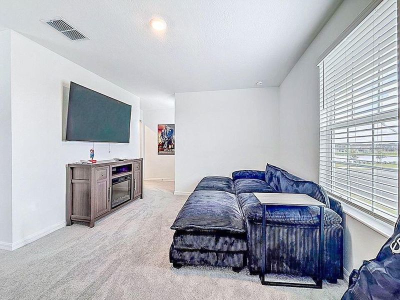 Furnished interior view inside a new home in Prosperity Lakes, Parrish (Image 8).