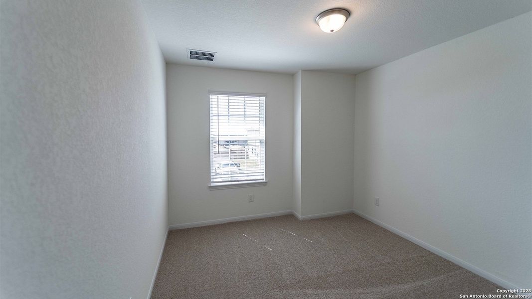 Spacious, unfurnished interior of a new home in Hunter's Ranch, San Antonio (Image 15).
