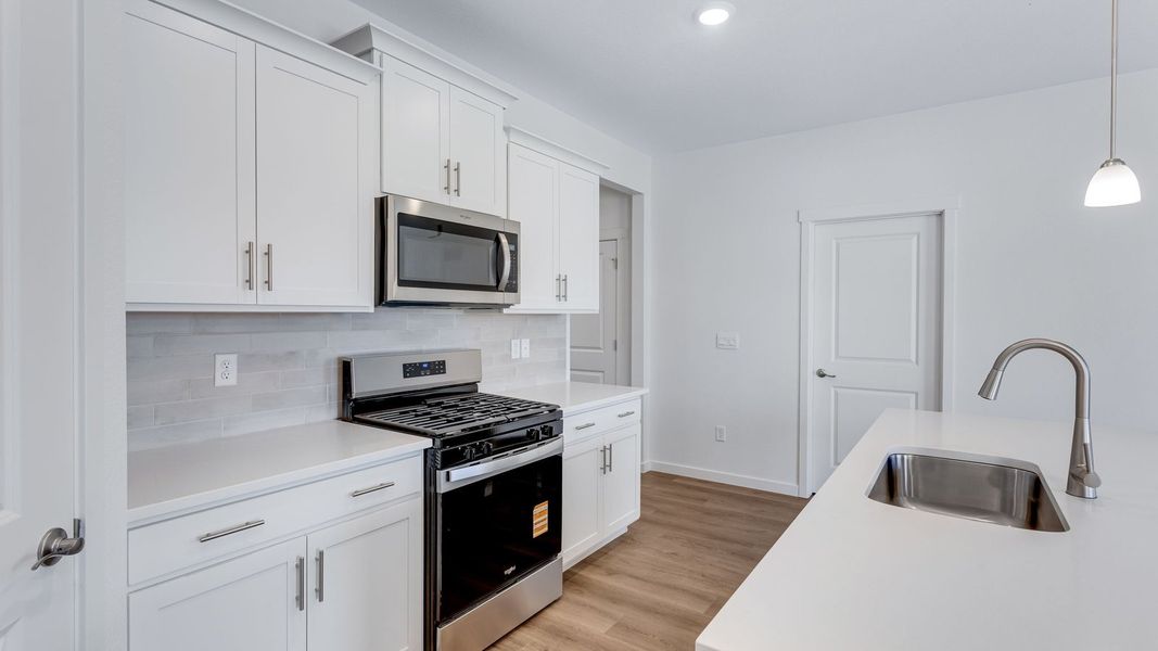 Furnished interior view inside a new home in Silver Peaks, Lochbuie (Image 6).
