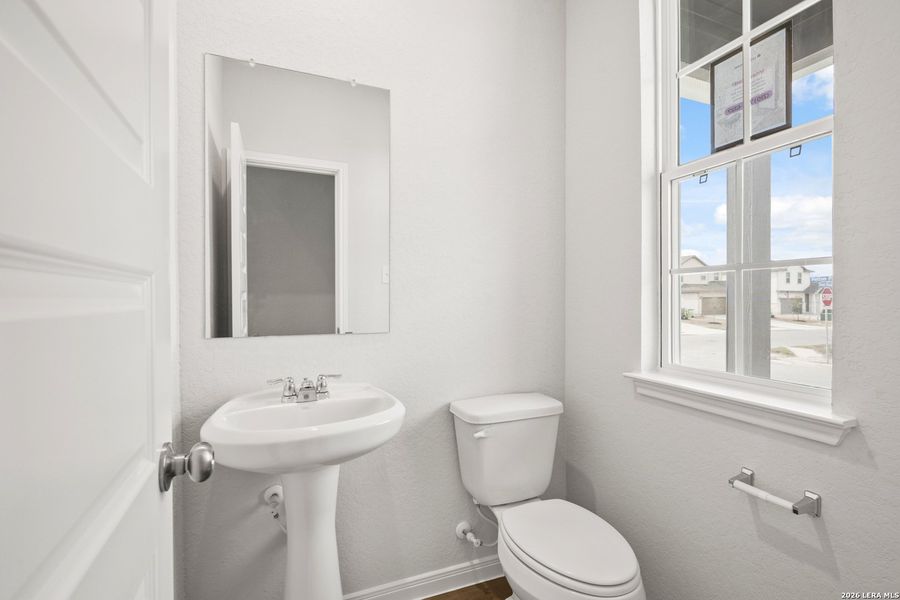 Furnished interior view inside a new home in Abbott Place, St. Hedwig (Image 9).