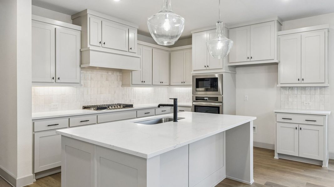 Representative furnished interior of a home built from the Toulouse II by Normandy Homes in Rainwater Crossing, Celina (Image 11).