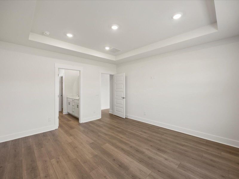 Spacious, unfurnished interior of a new home in The Coves at Lakes of Cane Bay, Summerville (Image 20). Spacious, unfurnished interior of a new home in The Coves at Lakes of Cane Bay, Summerville (Image 20).