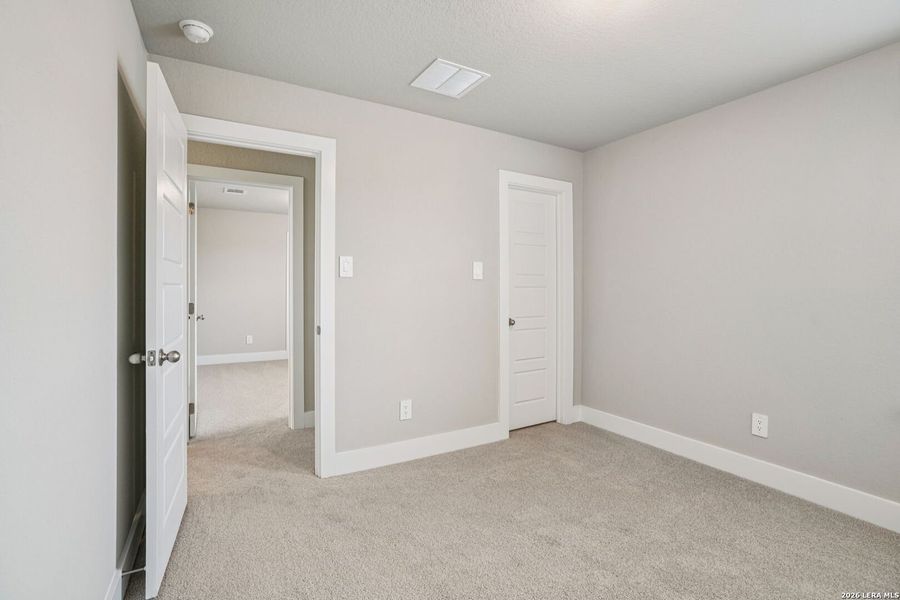 Spacious, unfurnished interior of a new home in Legendary Trails - Premier Series, Cibolo (Image 27).