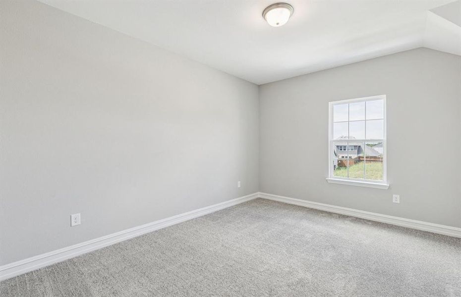 Secondary bedroom with large windows