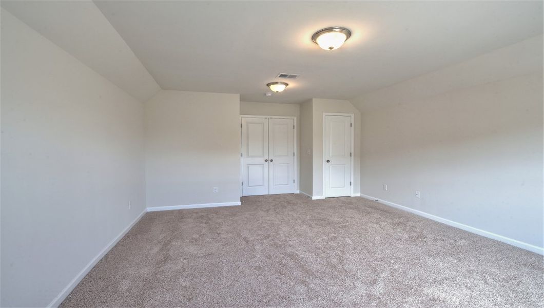 Spacious, unfurnished interior of a new home in Reserve at Tap Root Farms, Fletcher (Image 33). Spacious, unfurnished interior of a new home in Reserve at Tap Root Farms, Fletcher (Image 33).