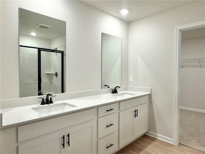 Furnished interior view inside a new home in Vines at Mill Creek - Estate Series, Braselton (Image 7).