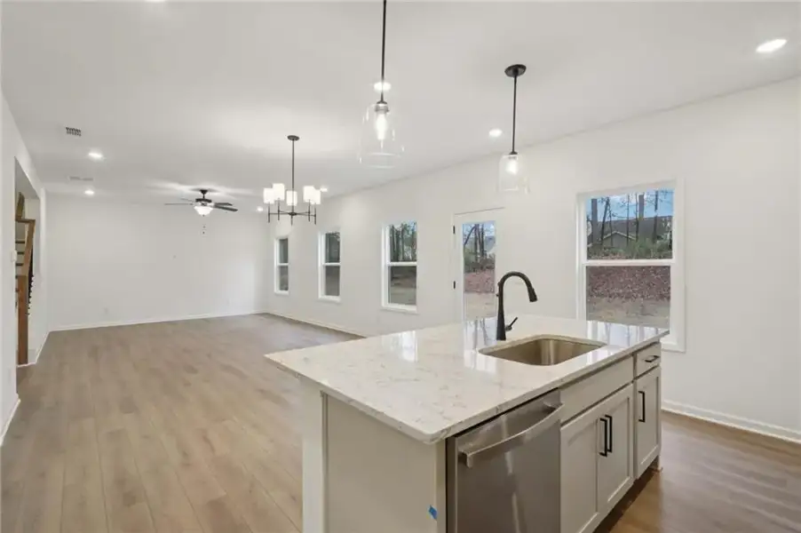 Furnished interior view inside a new home in Eastlyn Crossing, Flowery Branch (Image 5).