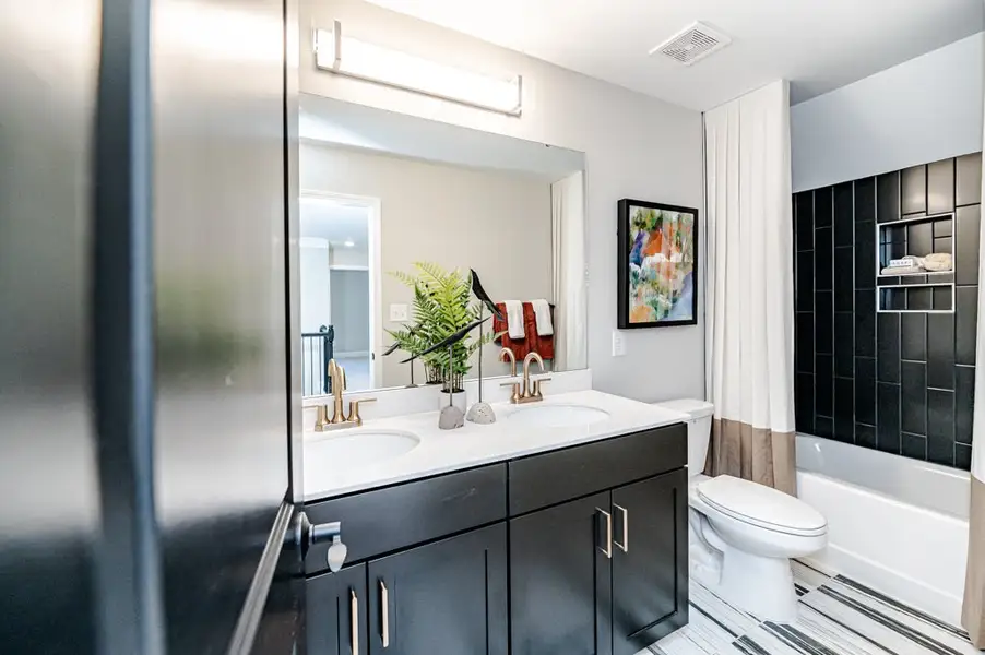 Representative furnished interior of a home built from the Biltmore by McKee Homes in Terrapin, Leland (Image 15).