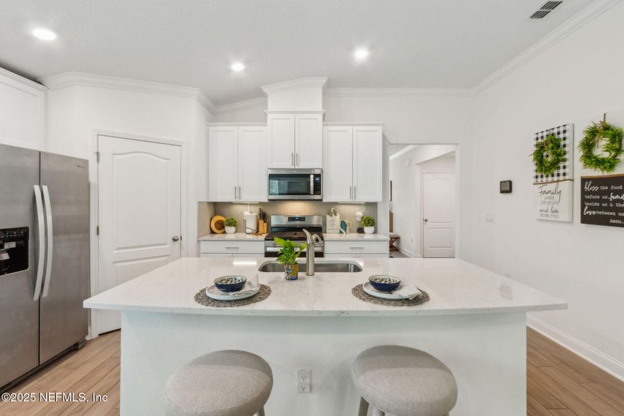 Furnished interior view inside a new home in Dorado at Entrada, St. Augustine (Image 13).