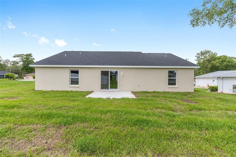 Front exterior of a new home in , Ocklawaha, FL, highlighting curb appeal (Image 17).