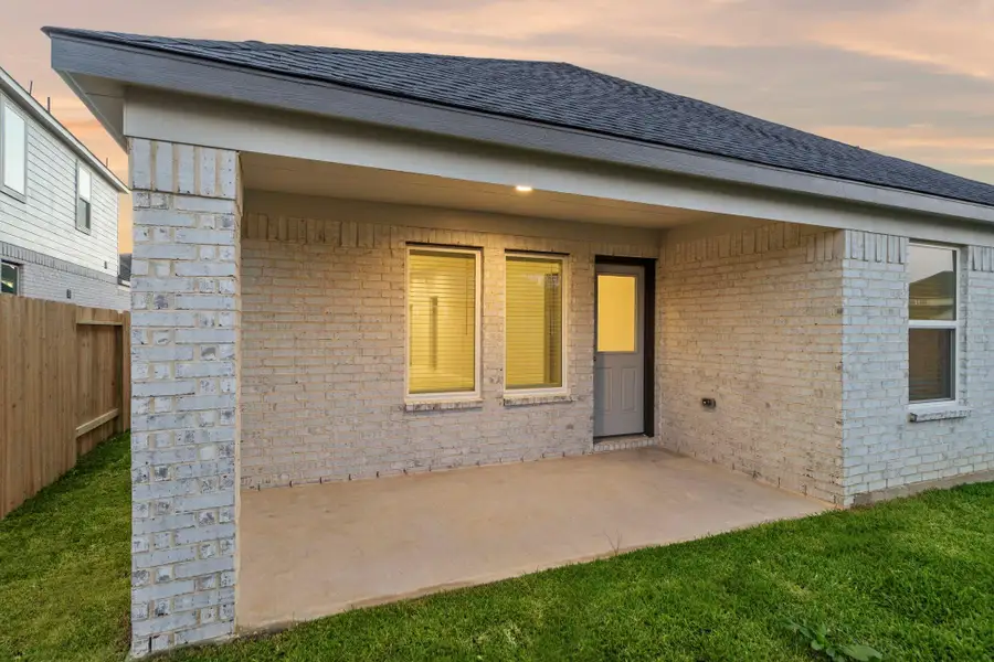 Exterior details and patio area of a home in Beacon Hill, Waller (Image 3). Exterior details and patio area of a home in Beacon Hill, Waller (Image 3).