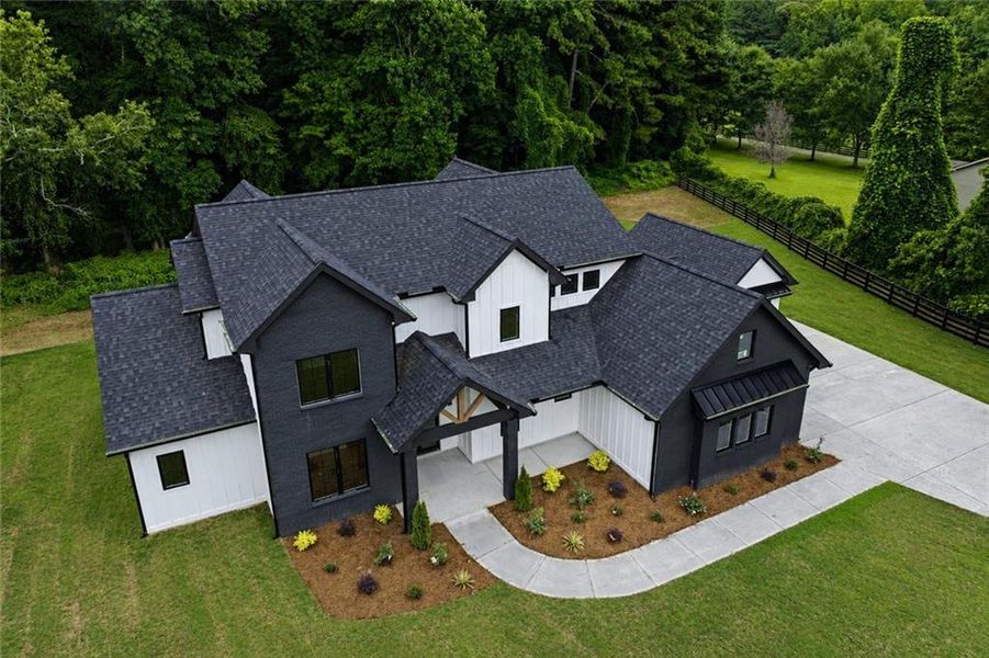 Front exterior of a new home in , Cumming, GA, highlighting curb appeal (Image 27).