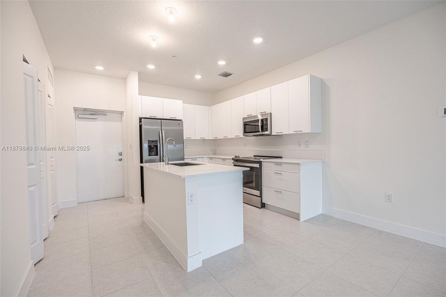 Furnished interior view inside a new home in , Doral (Image 12).