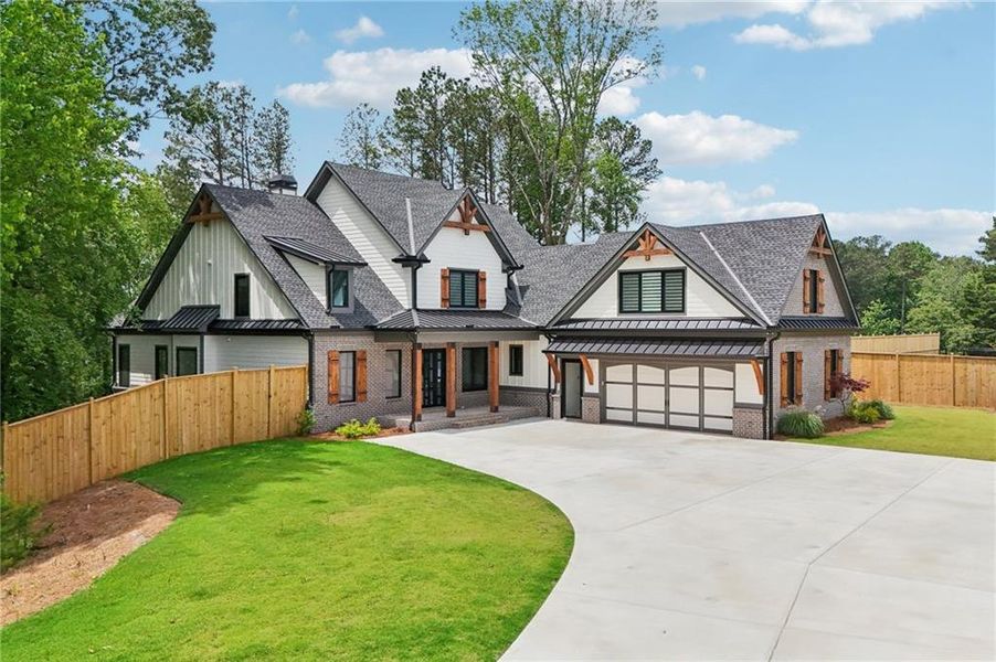 Front exterior of a new home in , Cumming, GA, highlighting curb appeal (Image 42). Front exterior of a new home in , Cumming, GA, highlighting curb appeal (Image 42).