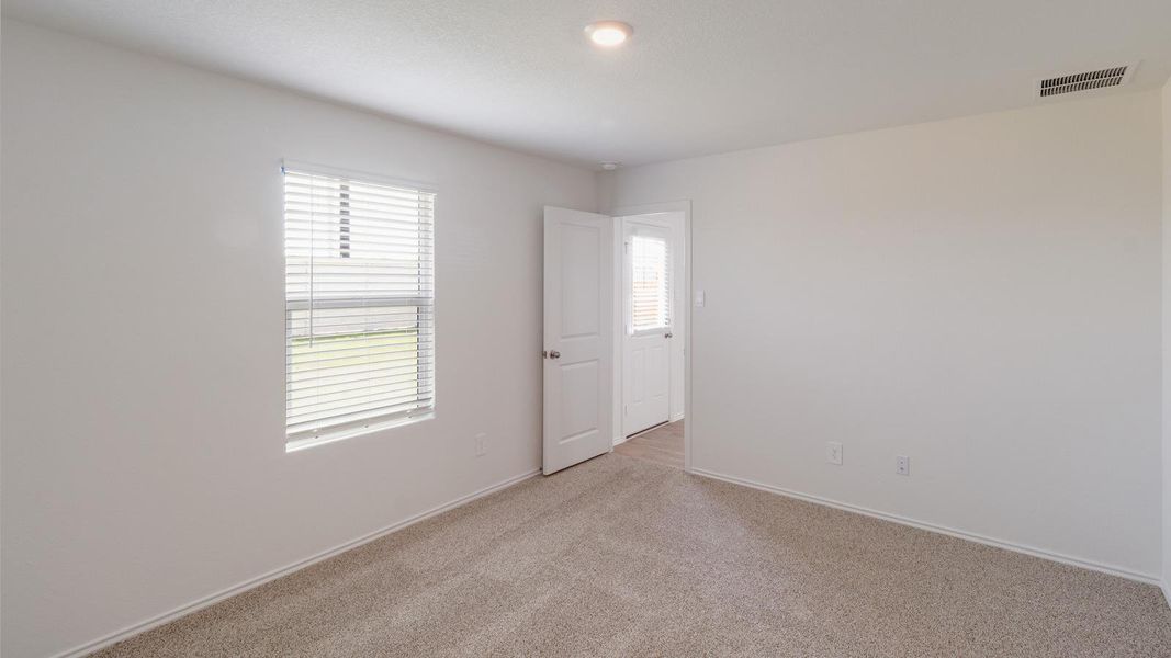Spacious, unfurnished interior of a new home in Wayside, Uhland (Image 19).